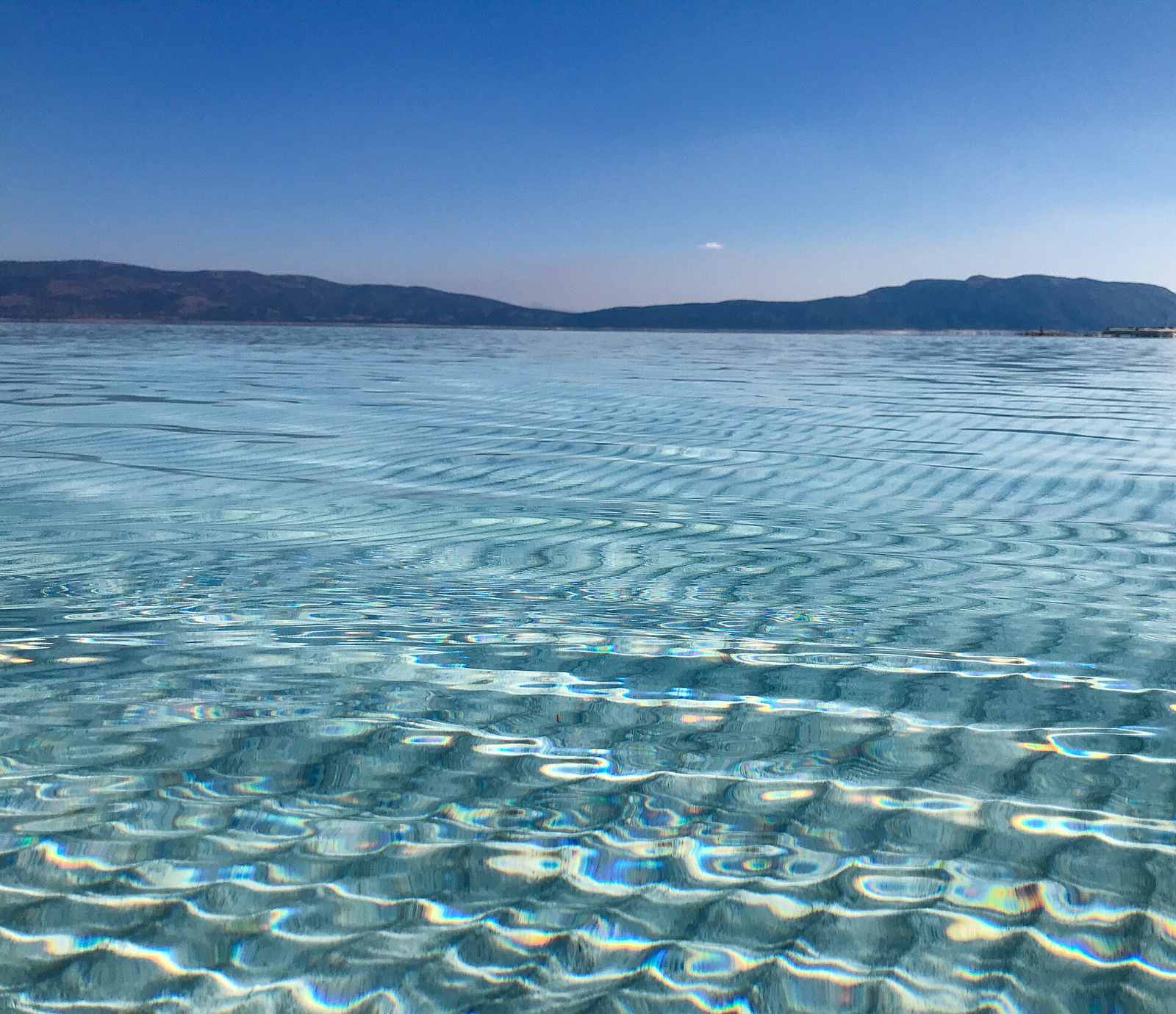 Close-up of white hydromagnesite mineral sediment on the Lake Salda shoreline